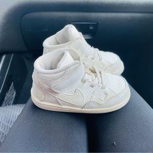 White Nike high tops toddler boy or girl size 7!